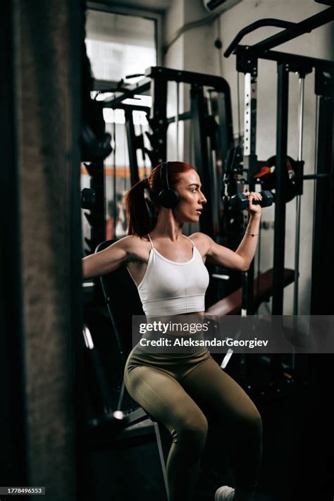 athletic redhead|Athletic Redhead Female Using Inspirational Music During Gym .